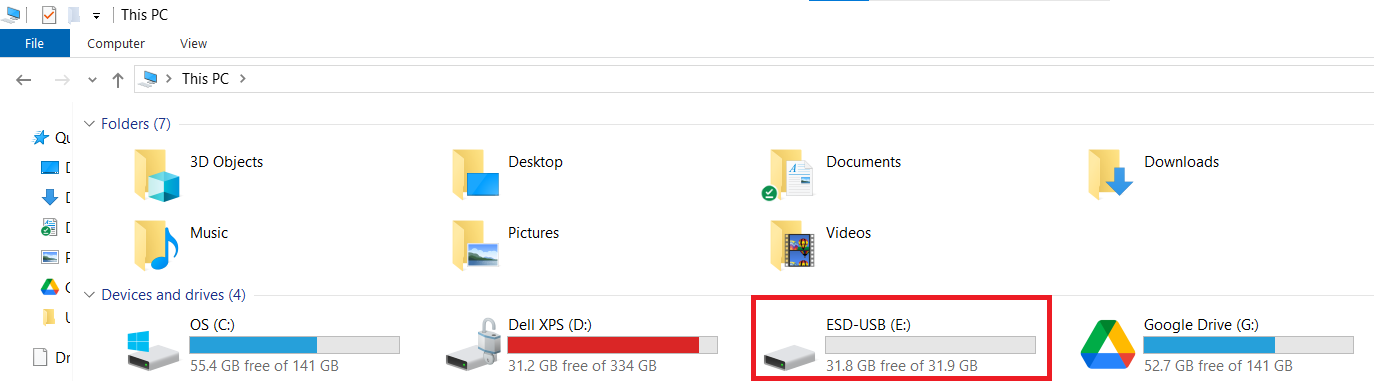 Windows File Explorer (This PC) view, with a red box highlighting the user's portable USB drive (e.g., ESD-USB (E:)).